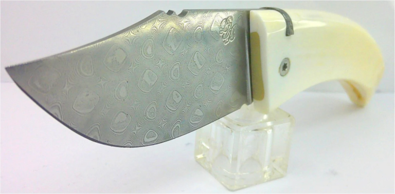 Cultella corsa lame acier damas et ivoire de phacochère avec blocage de lame